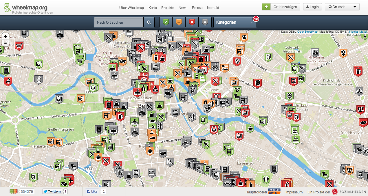 L'interface de Wheelmap. On voit de nombreux points d'intérêts (restaurants, transports en commun) complétés d'une couleur allant de vert à rouge pour indiquer la qualité de l'accessibilité.